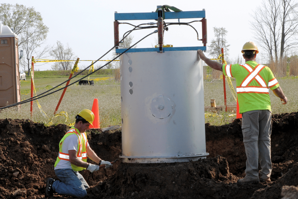 Construction workers install lysimeters