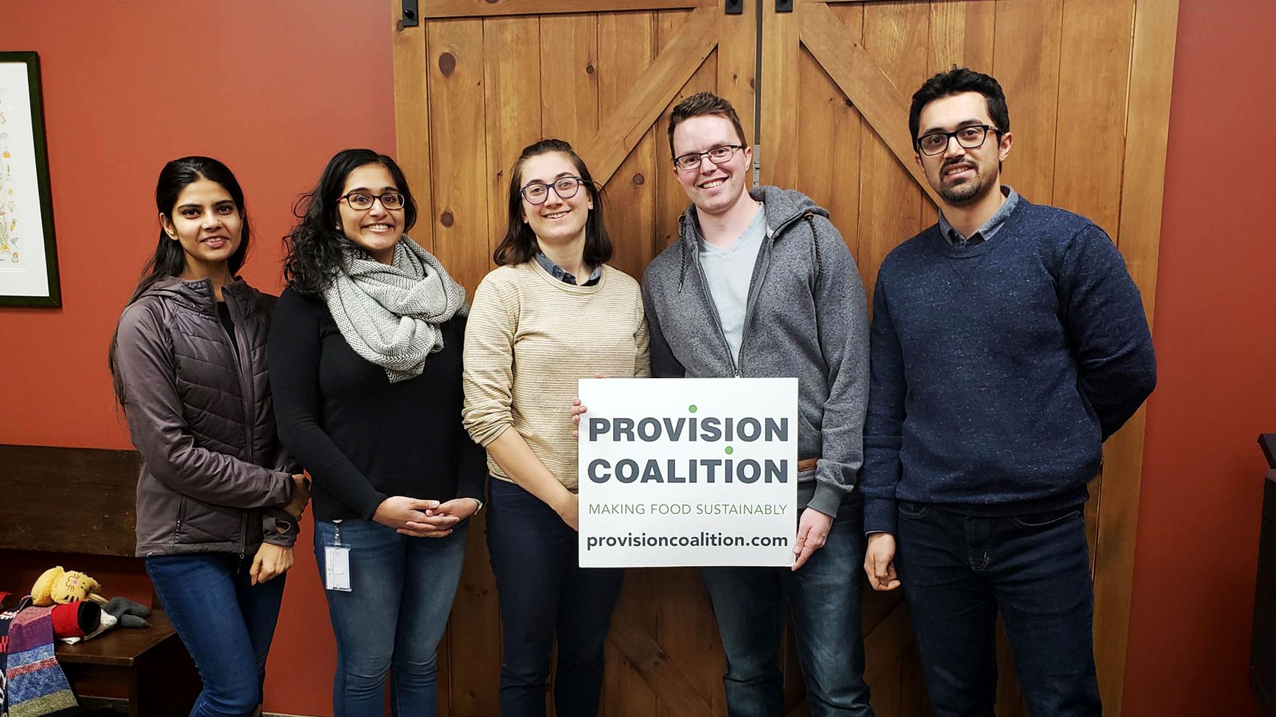 Sugandha Raj, Praveena Thirunathan, Simone Weinstein (Provision Coalition Project Coordinator), Jared Stoochnoff, and Seyed Ahmadi pose with a Provision Coalition sign.